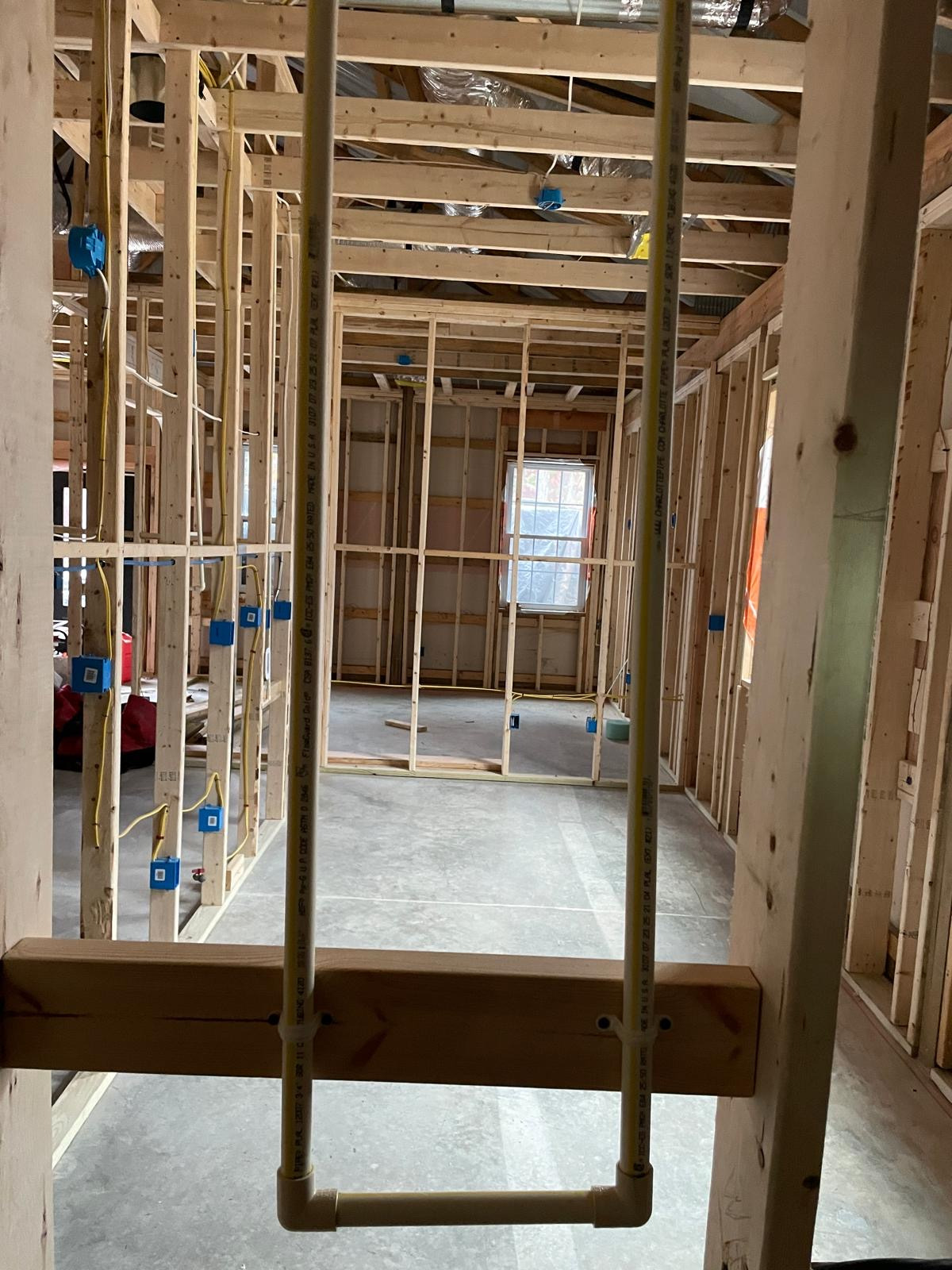 Interior wood framing prepared for construction rough-ins